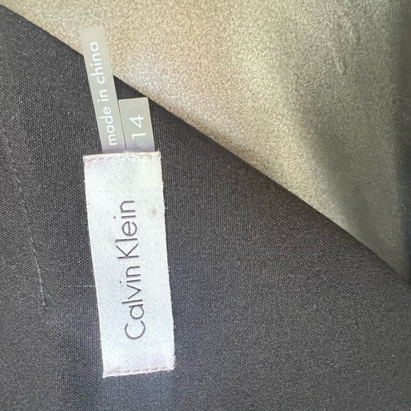 Black Calvin Klein Fully Lined Little Black Dress w/Gold closure at throat front - Picture 2 of 7